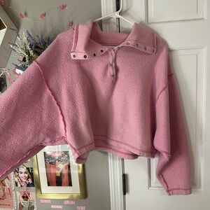 Urban Outfitters women's pink sweater